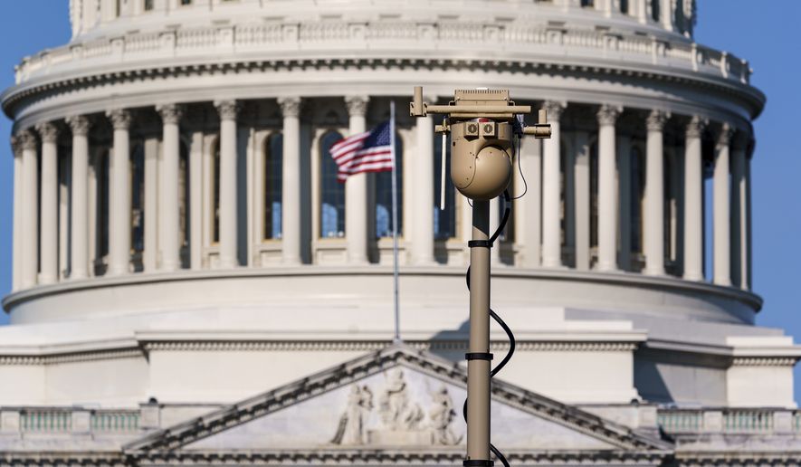 A video surveillance apparatus is seen on the East Front of the Capitol in Washington, Friday, Sept. 10, 2021, as security officials prepare for a Sept. 18 demonstration by supporters of the people arrested in the Jan. 6 riot. The camera surveillance system is on permanent loan from the U.S. Army but will be operated by the Capitol Police to enhance security around the Capitol grounds. Law enforcement officials concerned by the prospect for violence at a rally in the nation&#39;s capital next week are planning to reinstall protective fencing that surrounded the U.S. Capitol for months after the Jan. 6 insurrection there. (AP Photo/J. Scott Applewhite)
