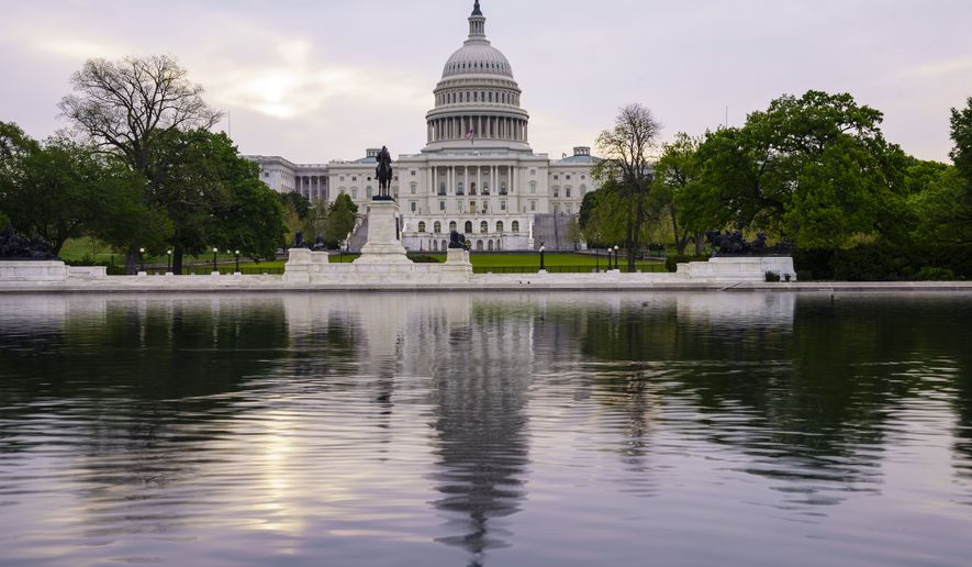This April 28, 2021, file photo shows the U.S. Capitol building in Washington. (AP Photo/J. Scott Applewhite, File) **FILE**