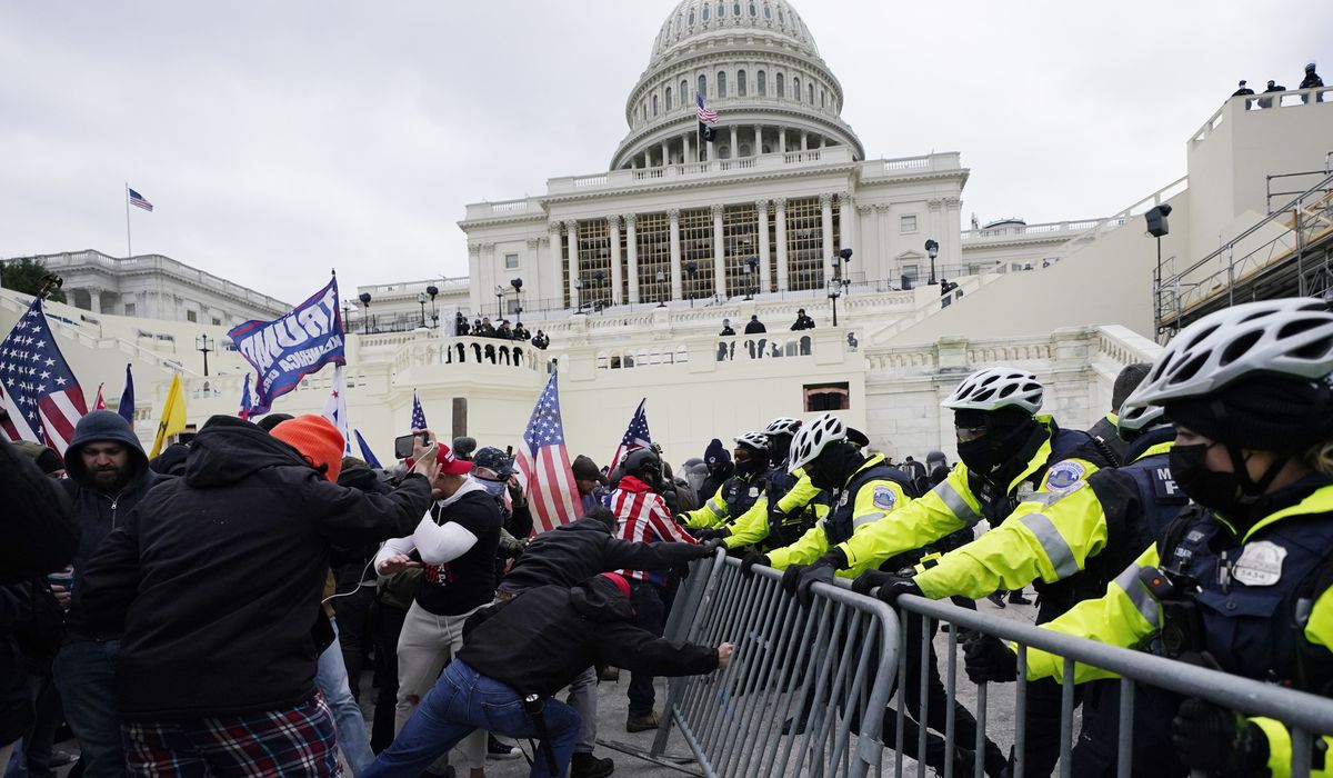 Poll shows dramatic partisan differences in how Americans view Jan. 6 riot at the U.S. Capitol