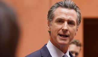 California Gov. Gavin Newsom responds to a question while meeting with reporters after casting his recall ballot at a voting center in Sacramento, Calif., Friday, Sept. 10, 2021. The last day to vote in the recall election is Tuesday Sept. 14. A majority of voters must mark &amp;quot;no&amp;quot; on the recall to keep Newsom in office. (AP Photo/Rich Pedroncelli)