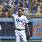 Los Angeles Dodgers Max Scherzer tips his cap after he pitched his 3000th career strikeout against San Diego Padres first baseman Eric Hosmer in the fifth inning during in a baseball game Sunday, Sept. 12, 2021, in Los Angeles, Calif. (AP Photo/John McCoy) **FILE**