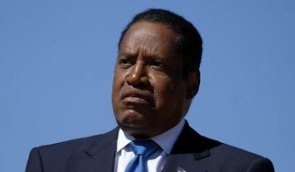 Republican conservative radio show host Larry Elder speaks at a rally for the California gubernatorial recall election on Monday, Sept. 13, 2021, in Monterey Park, Calif. (AP Photo/Ringo H.W. Chiu)