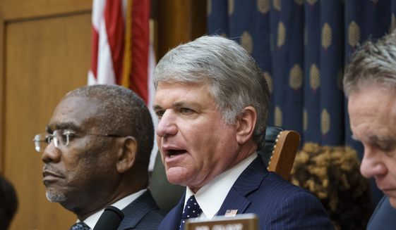 Rep. Michael McCaul, R-Texas, ranking member of the House Foreign Affairs Committee, joined at left by Chairman Gregory Meeks, D-N.Y., discusses the U.S. withdrawal from Afghanistan with Secretary of State Antony Blinken who appeared remotely, at the Capitol in Washington on Monday, Sept. 13, 2021. (AP Photo/J. Scott Applewhite) **FILE**
