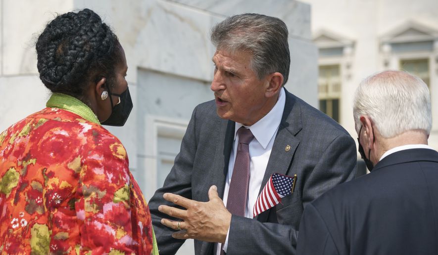 Sen. Joe Manchin, D-W.Va., speaks with Rep. Sheila Jackson Lee, D-Tex., left, and Rep. Mike Thompson, D-Calif., right, on the steps of the Capitol on Monday, Sept. 13, 2021.  (AP Photo/J. Scott Applewhite)  **FILE**