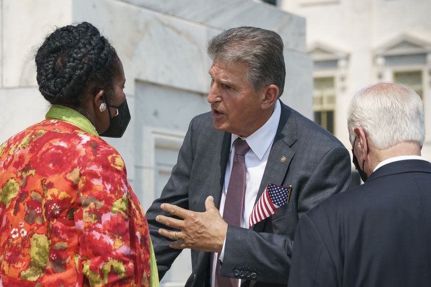 Sen. Joe Manchin, D-W.Va., speaks with Rep. Sheila Jackson Lee, D-Tex., left, and Rep. Mike Thompson, D-Calif., right, on the steps of the Capitol on Monday, Sept. 13, 2021.  (AP Photo/J. Scott Applewhite)  **FILE**