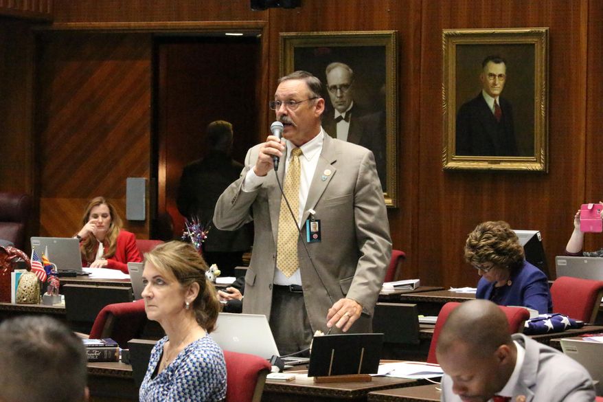 In this May 2, 2018, file photo, Republican Rep. Mark Finchem argues against an amendment to the state budget proposed by minority Democrats, at the Capitol in Phoenix. Former President Donald Trump is giving his influential endorsement to Finchem, who was at the Jan. 6, 2021, insurrection and worked to overturn Trump's 2020 loss. Trump's endorsement Monday, Sept. 13, 2021, of Tucson-area Finchem is likely to be crucial in the crowded in the Republican primary for Arizona's top election official. (AP Photo/Bob Christie, File)