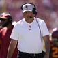 Southern California head coach Clay Helton walks on the sideline during an NCAA college football game against San Jose State Saturday, Sept. 4, 2021, in Los Angeles. (AP Photo/Ashley Landis) *** FILE**