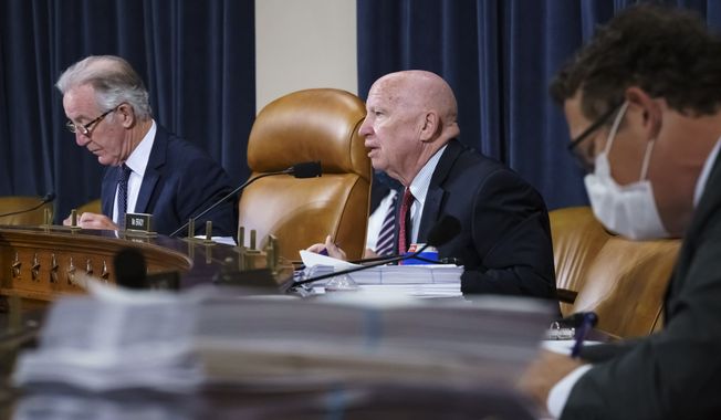 House Ways and Means Committee Chairman Richard Neal, D-Mass., left, and Rep. Kevin Brady, R-Texas, the ranking member, center right, make opening statements as the tax-writing panel continues work on the Democrats&#x27; sweeping proposal for tax hikes on big corporations and the wealthy to fund President Joe Biden&#x27;s $3.5 trillion domestic rebuilding plan, at the Capitol in Washington, Tuesday, Sept. 14, 2021. (AP Photo/J. Scott Applewhite)