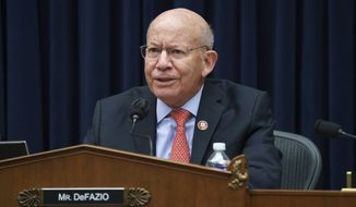 House Transportation and Infrastructure Committee Chair Peter DeFazio, D-Ore., gavels in his panel to work on the reconciliation markup, part of President Joe Biden&#39;s $3.5 trillion domestic rebuilding plan, at the Capitol in Washington, Tuesday, Sept. 14, 2021. (AP Photo/J. Scott Applewhite)