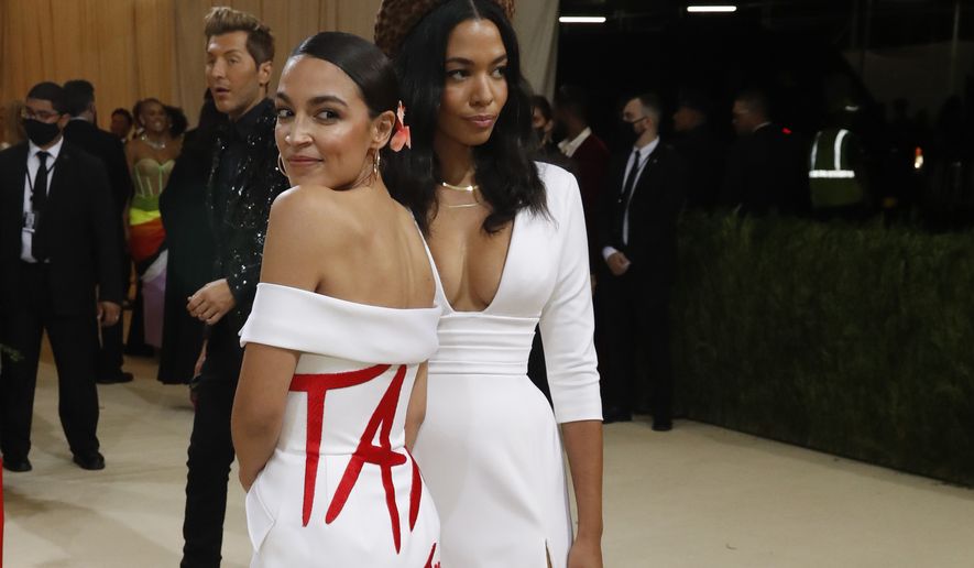 Metropolitan Museum of Art Costume Institute Gala - Met Gala - In America: A Lexicon of Fashion - Arrivals - New York City, U.S. - September 13, 2021. Rep. Alexandria Ocasio-Cortez (D-NY) wears a &quot;Tax The Rich&quot; dress. REUTERS/Mario Anzuoni - HP1EH9E03NL44