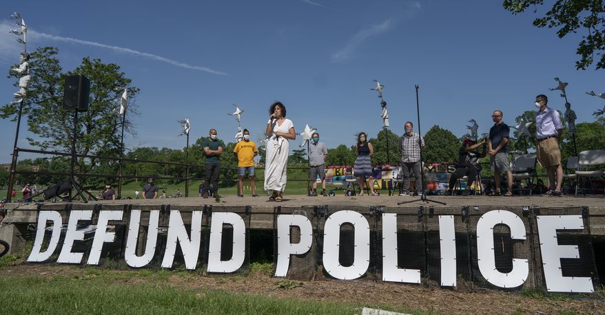 In this Sunday, June 7, 2020, photo, Alondra Cano, a city council member, speaks during "The Path Forward" meeting at Powderhorn Park in Minneapolis, which was organized to talk about the defunding of the Minneapolis Police Department. (Jerry Holt/Star Tribune via AP) **FILE**