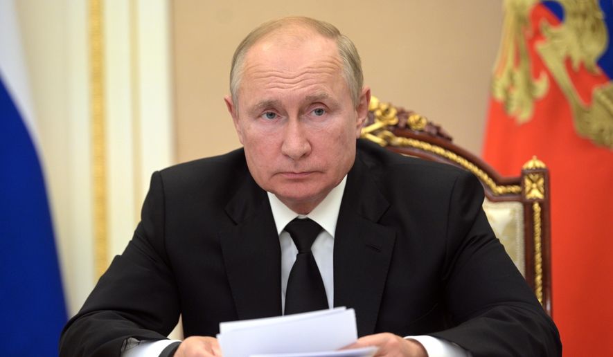 In this Thursday, Sept. 9, 2021, file photo, Russian President Vladimir Putin speaks during a meeting in Moscow, Russia. (Alexei Druzhinin, Sputnik, Kremlin Pool Photo via AP, File)