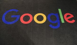 In this Monday, Nov. 18, 2019, file photo, the logo of Google is displayed on a carpet at the entrance hall of Google France in Paris. South Korea’s competition watchdog says it plans to fine Google at least 207.4 billion won ($177 million) for allegedly blocking smartphone makers like Samsung from using other operating systems, in what would be one of the country&#39;s biggest antitrust penalties ever. (AP Photo/Michel Euler, File)