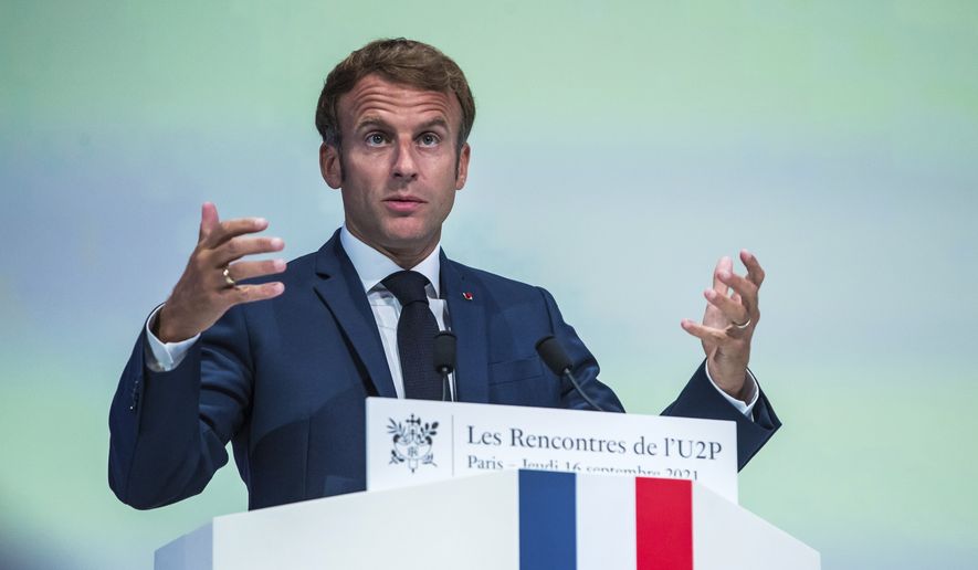 In this file photo, French President Emmanuel Macron delivers his speech during a meeting of the &#x27;U2P&#x27;, French local businesses union, in Paris, Thursday, Sept. 16 2021. (Christophe Petit Tesson, Pool Photo via AP)  **FILE**