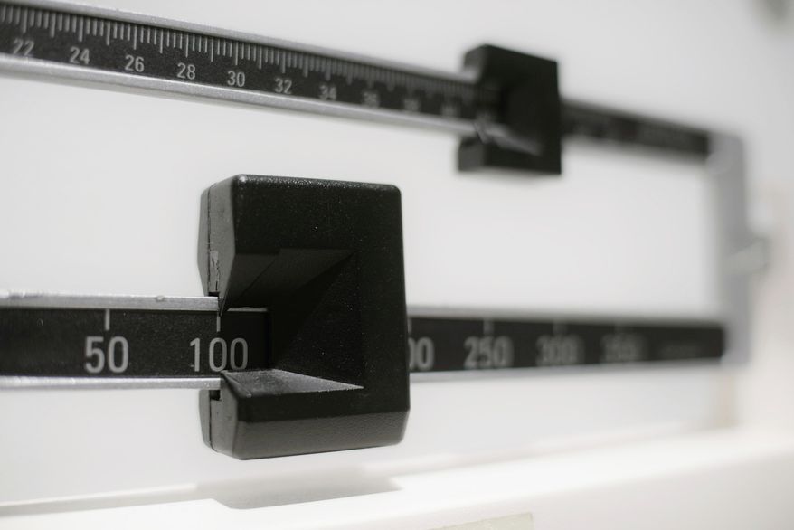 This Tuesday, April 3, 2018, file photo shows a closeup of a beam scale in New York. (AP Photo/Patrick Sison, File)