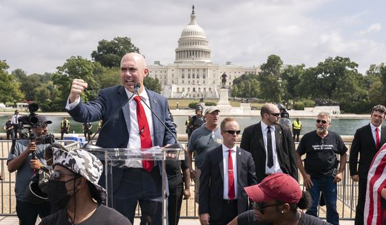 Matt Braynard, organizer of the Justice For J6 rally, speaks near the U.S. Capitol in Washington, Saturday, Sept. 18, 2021. The rally was planned by allies of former President Donald Trump and aimed at supporting the so-called &quot;political prisoners&quot; of the Jan. 6 insurrection at the U.S. Capitol. (AP Photo/Nathan Howard)