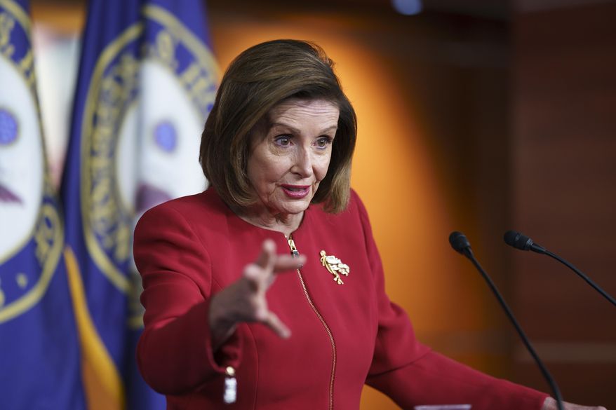In this Sept. 8, 2021, file photo speaker of the House Nancy Pelosi, D-Calif., meets with reporters to discuss President Joe Biden's domestic agenda including passing a bipartisan infrastructure bill and pushing through a Democrats-only expansion of the social safety net, the at the Capitol in Washington. (AP Photo/J. Scott Applewhite, File)