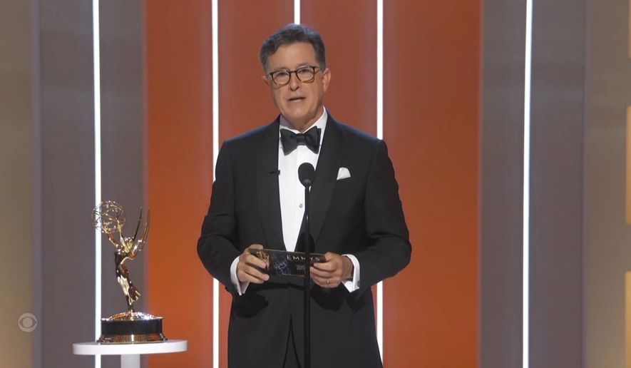 In this video grab issued Sunday, Sept. 19, 2021, by the Television Academy, Stephen Colbert presents the award for outstanding supporting actress in a drama series during the Primetime Emmy Awards. (Television Academy via AP)