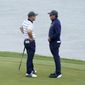 Team USA&#39;s Bryson DeChambeau talks to Phil Mickelson on the third hole during a practice day at the Ryder Cup at the Whistling Straits Golf Course Tuesday, Sept. 21, 2021, in Sheboygan, Wis. (AP Photo/Charlie Neibergall) **FILE**
