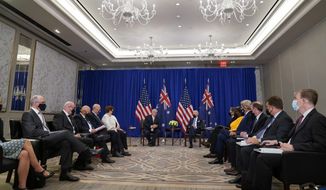 President Joe Biden meets with Australian Prime Minister Scott Morrison at the Intercontinental Barclay Hotel during the United Nations General Assembly, Tuesday, Sept. 21, 2021, in New York. (AP Photo/Evan Vucci)