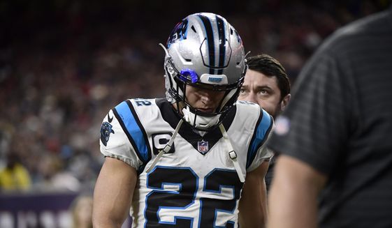Carolina Panthers running back Christian McCaffrey (22) leaves the field during the first half of an NFL football game against the Houston Texans Thursday, Sept. 23, 2021, in Houston. (AP Photo/Justin Rex) **FILE**