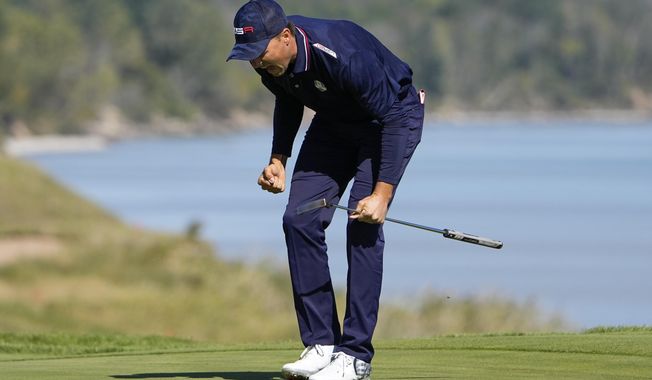 Team USA&#x27;s Jordan Spieth reacts after making a putt on the 16th hole during a foursomes match the Ryder Cup at the Whistling Straits Golf Course Saturday, Sept. 25, 2021, in Sheboygan, Wis. (AP Photo/Jeff Roberson)