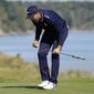 Team USA&#39;s Jordan Spieth reacts after making a putt on the 16th hole during a foursomes match the Ryder Cup at the Whistling Straits Golf Course Saturday, Sept. 25, 2021, in Sheboygan, Wis. (AP Photo/Jeff Roberson)