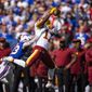 Washington Football Team wide receiver Terry McLaurin (17) makes a pass reception against Buffalo Bills strong safety Micah Hyde (23) during the second quarter of an NFL football game, Sunday, Sept. 26, 2021, in Orchard Park, N.Y. (AP Photo/Brett Carlsen) **FILE**