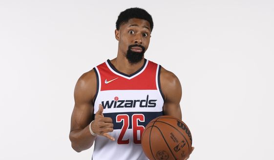 Washington Wizards guard Spencer Dinwiddie poses for a photograph during an NBA basketball media day, Monday, Sept. 27, 2021, in Washington. (AP Photo/Nick Wass) **FILE**