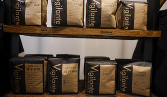 Bags of coffee are on display at Vigilante Coffee, Wednesday, Sept. 1, 2021, in College Park, Md. A confluence of supply chain problems, drought, frost and inflation all point to the price of your cup of morning coffee going up. The tricky part is trying to figure when — and how much. A sustained drought followed by two July frosts blew a hole in Brazil&#39;s coffee output, sending futures contract prices for the popular Arabica bean to near seven-year highs. (AP Photo/Julio Cortez)