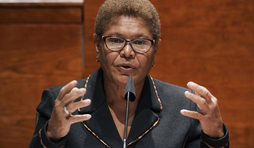 FILE - In this June 17, 2020, file photo, Rep. Karen Bass, D-Calif., speaks on Capitol Hill in Washington. Bass, a prominent figure in national Democratic politics who was on President Joe Biden&#39;s shortlist of candidates when he was considering a vice presidential pick, is planning to run for Los Angeles mayor, a person familiar with her plans said Friday, Sept. 24, 2021. (Greg Nash/Pool Photo via AP, File)