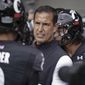 Cincinnati head coach Luke Fickell speaks with quarterback Desmond Ridder (9) prior to an NCAA college football game against Miami (Ohio) in Cincinnati, in this Saturday, Sept. 4, 2021, file photo. Cincinnati coach Luke Fickell talks about the opportunity the No. 7 Bearcats have to impress the nation when they travel to South Bend, Indiana, to face No. 9 Notre Dame. (AP Photo/Jeff Dean, File) **FILE**