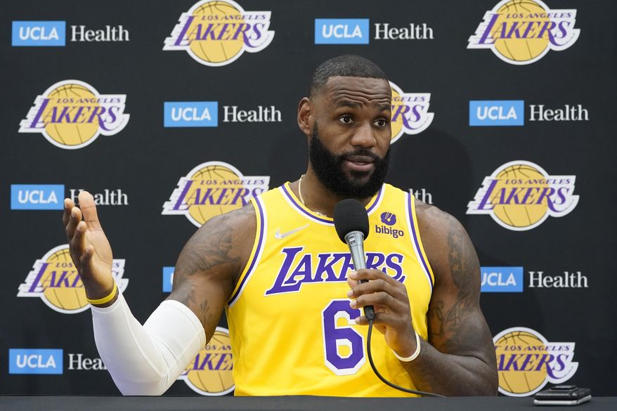 Los Angeles Lakers forward LeBron James fields questions during the NBA basketball team&#39;s Media Day Tuesday, Sept. 28, 2021, in El Segundo, Calif. (AP Photo/Marcio Jose Sanchez)