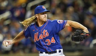 New York Mets&#39; Noah Syndergaard pitches during the first inning in the second baseball game of a doubleheader against the Miami Marlins Tuesday, Sept. 28, 2021, in New York. (AP Photo/Frank Franklin II)