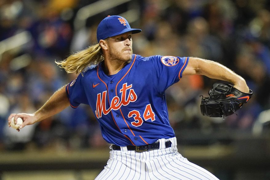 New York Mets&#39; Noah Syndergaard pitches during the first inning in the second baseball game of a doubleheader against the Miami Marlins Tuesday, Sept. 28, 2021, in New York. (AP Photo/Frank Franklin II)