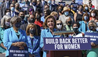 In this Sept. 24, 2021 photo, House Speaker Nancy Pelosi, D-Calif., holds a rally in support of President Joe Biden&#39;s &amp;quot;Build Back Better&amp;quot; for women agenda, at the Capitol in Washington. President Joe Biden’s plan for a massive expansion of social programs is being framed by supporters as such a high-stakes endeavor that it’s “too big to fail.” It also may be too big to describe.  That’s a particular challenge as the White House struggles to sell the public on a wide range of initiatives packaged under the imprecise slogan of “Build Back Better.”  (AP Photo/J. Scott Applewhite)