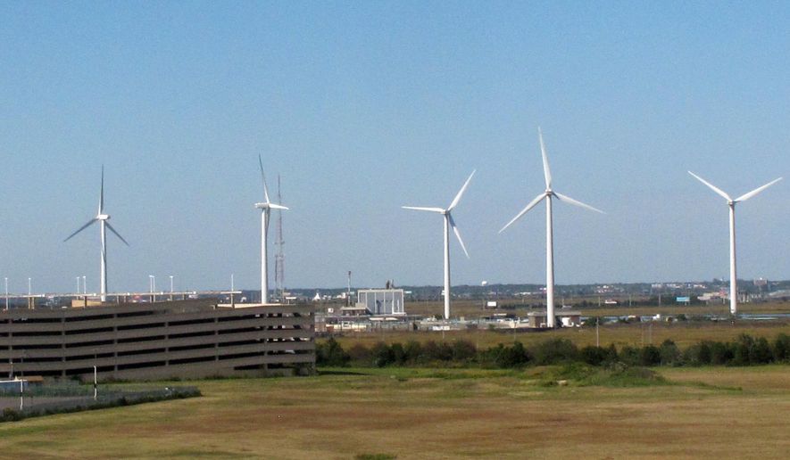 FILE - This Oct. 1, 2020 file photo shows windmills at a utility plant in Atlantic City N.J. Atlantic Shores, a company that already has approval to build an offshore wind farm off the coast of Atlantic City, is planning a second wind project. (AP Photo/Wayne Parry, file)