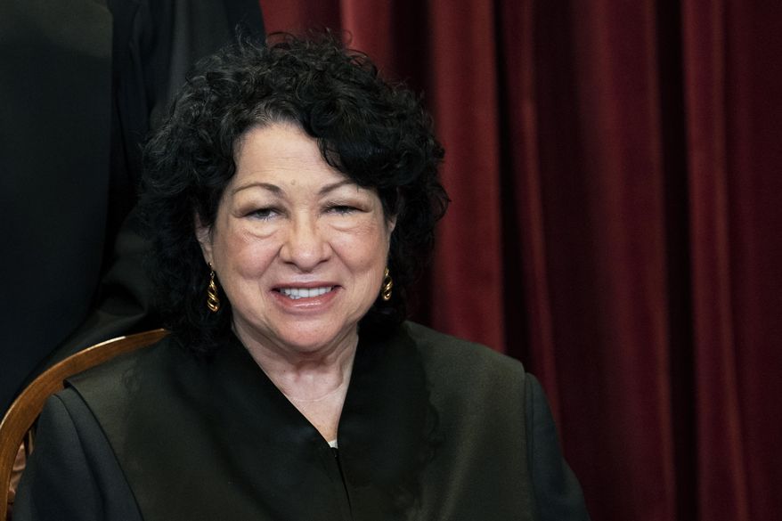 FILE - In this April 23, 2021, file photo Associate Justice Sonia Sotomayor sits during a group photo at the Supreme Court in Washington. Acknowledging the limits of her own influence on the law as a member of the Supreme Court&#39;s liberal minority, Sotomayor on Wednesday, Sept. 29, encouraged citizens to work to change laws they may disagree with, like a recent Texas law that limits access to abortions. (Erin Schaff/The New York Times via AP, Pool, File)