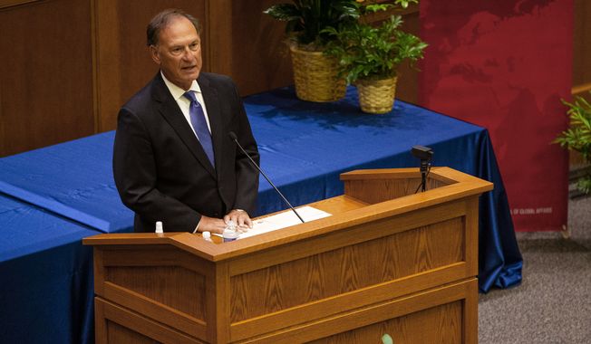 Supreme Court Justice Samuel Alito addresses the audience during the &quot;The Emergency Docket&quot; lecture Thursday, Sept. 30, 2021 in the McCartan Courtroom at the University of Notre Dame Law School in South Bend, Ind. (Michael Caterina /South Bend Tribune via AP)