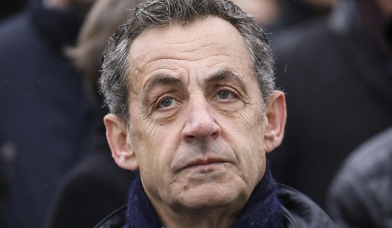 In this Monday, Nov. 11, 2019, file photo, former French President Nicolas Sarkozy attends a ceremony at the Arc de Triomphe in Paris. (Ludovic Marin/Pool via AP, File)