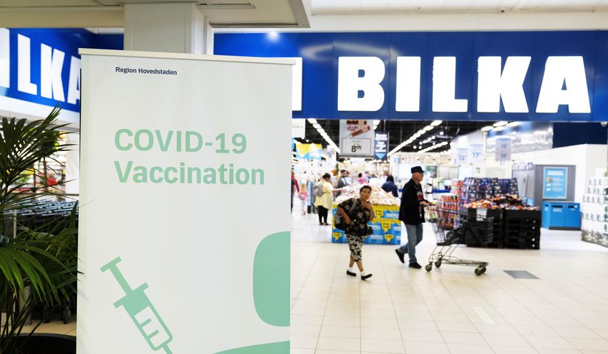 A view of a pop-up COVID-19 vaccination day in the supermarket Bilka, in Ishoej, Denmark, Saturday, Sept. 11, 2021. (Claus Bech/Ritzau Scanpix via AP) ** FILE **