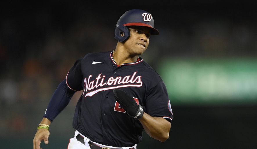 Washington Nationals&#39; Juan Soto runs to third on a single by Keibert Ruiz during the fourth inning of a baseball game against the Boston Red Sox, Friday, Oct. 1, 2021, in Washington. (AP Photo/Nick Wass) **FILE**