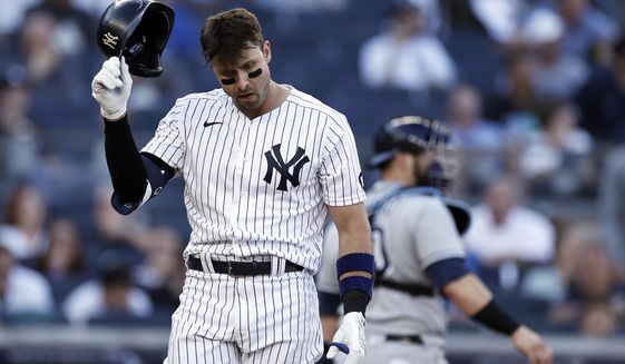 New York Yankees&#39; Joey Gallo reacts after striking out during the eighth inning of a baseball game against the Tampa Bay Rays on Saturday, Oct. 2, 2021, in New York. (AP Photo/Adam Hunger)