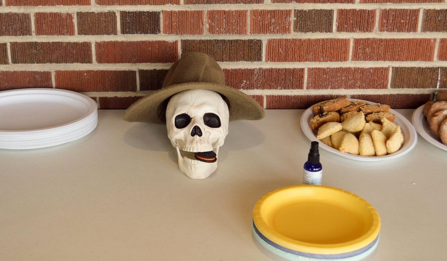 A plastic skull named Edward welcomed participants to the Death Cafe at the Shane Lalani Center for the Arts in Livingston, Mont., on Sunday, Sept. 20, 2021. Mariana Olsen and her husband, Will Bernard, brought Death Cafe to Livingston to break the taboo of discussing death. (Alex Miller, Bozeman Daily Chronicle)