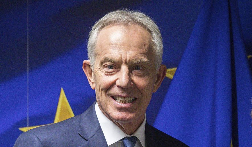 Former British Prime Minister Tony Blair is shown ahead of a meeting at the EU Charlemagne building in Brussels, in this Wednesday, Nov. 6, 2019, file photo. Hundreds of world leaders, powerful politicians, billionaires, celebrities, religious leaders and drug dealers have been stashing away their investments in mansions, exclusive beachfront property, yachts and other assets for the past quarter century, according to a review of nearly 12 million files obtained from 14 different firms located around the world. The report released Sunday, Oct. 3, 2021, by the International Consortium of Investigative Journalists involved 600 journalists from 150 media outlets in 117 countries. Former British Prime Minister Tony Blair is one of 330 current and former politicians identified as beneficiaries of the secret accounts. (Stephanie Lecocq/Pool via AP, File)