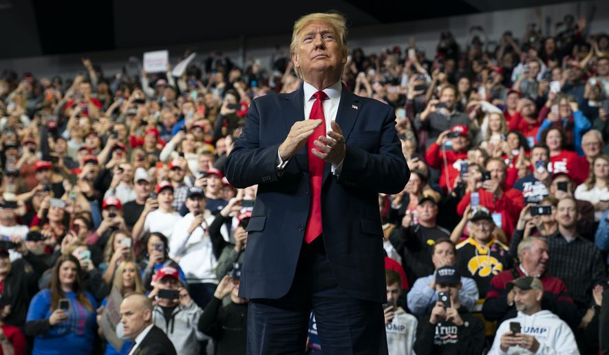 President Donald Trump arrives to speak at a campaign rally on the campus of Drake University, Thursday, Jan. 30, 2020, in Des Moines, Iowa. (AP Photo/ Evan Vucci)