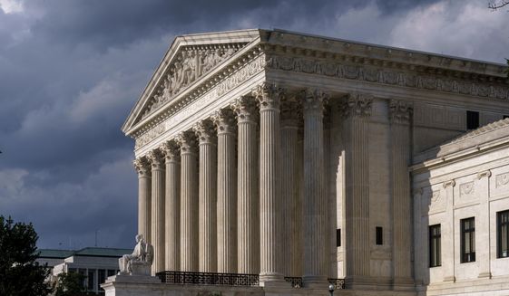 FILE - This June 8, 2021 file photo shows the Supreme Court building in Washington. The future of abortion rights is in the hands of a conservative Supreme Court that is beginning a new term Monday, Oct. 4, that also includes major cases on gun rights and religion. (AP Photo/J. Scott Applewhite, File)
