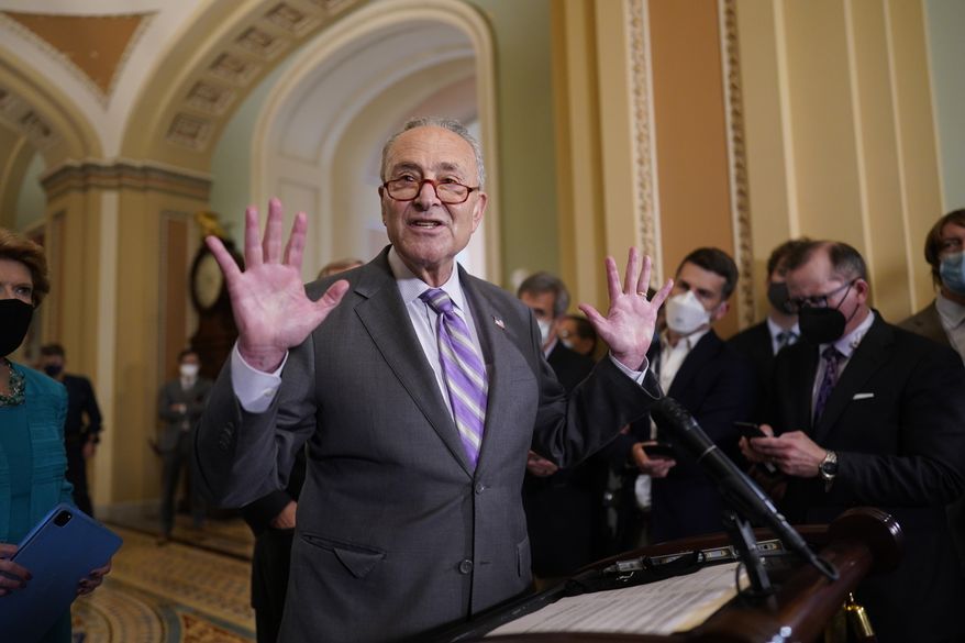 Senate Majority Leader Chuck Schumer, D-N.Y., speaks to reporters after a Democratic policy meeting at the Capitol in Washington, Tuesday, Oct. 5, 2021. (AP Photo/J. Scott Applewhite) ** FILE **