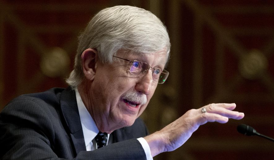 Dr. Francis Collins, director of the National Institutes of Health, appears before a Senate Health, Education, Labor and Pensions Committee hearing to discuss vaccines and protecting public health during the coronavirus pandemic on Capitol Hill, on Wednesday, Sept. 9, 2020, in Washington. Collins says he is stepping down by the end of the year, having led the research center for 12 years and becoming a prominent source of public information during the coronavirus pandemic. A formal announcement was expected Tuesday, Oct. 5, 2021, from NIH. (Michael Reynolds/Pool via AP, File)