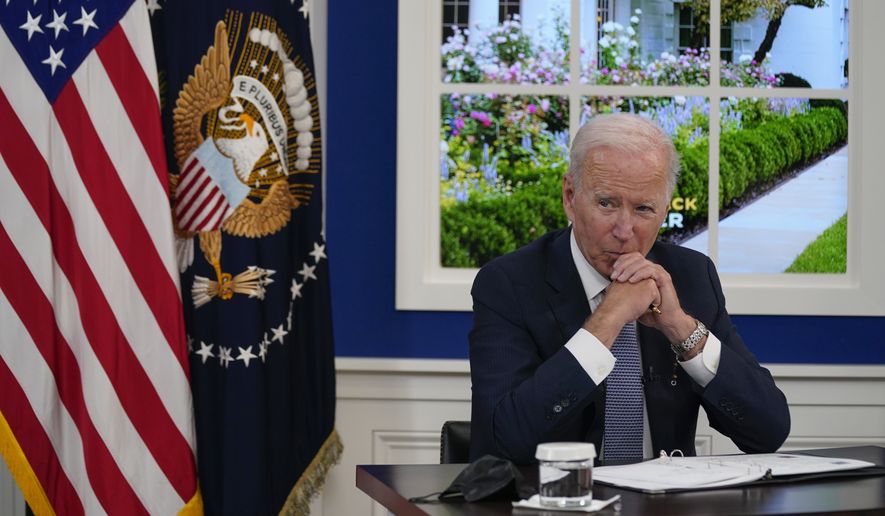 President Joe Biden listens during a meeting with business leaders about the debt limit in the South Court Auditorium on the White House campus, Wednesday, Oct. 6, 2021, in Washington. (AP Photo/Evan Vucci) **FILE**